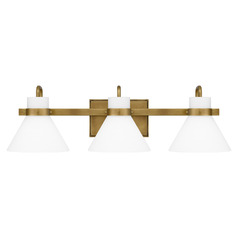 Regency 25-Inch Wide Bath Light in Weathered Brass by Quoizel Lighting